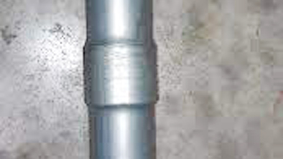 Heating the end of an exhaust tube and driving in a smooth steel socket as a mandrel