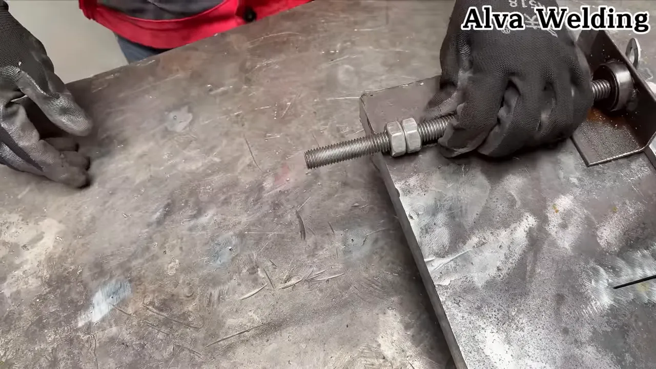 Inspecting bearings and tightening mounting fasteners during maintenance