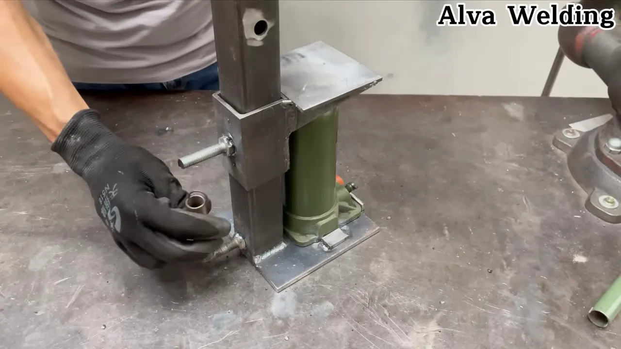 testing the press by crushing a bearing under the jack