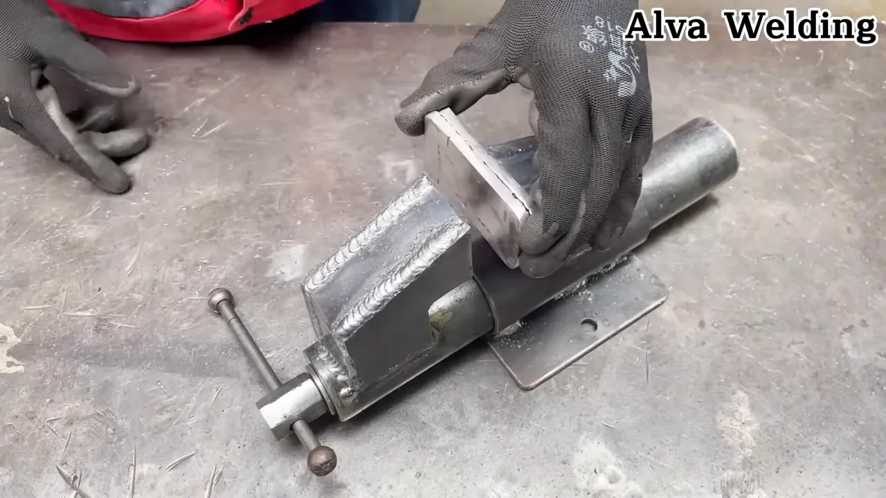 Adjustable clamp jig holding square tubing for tacking